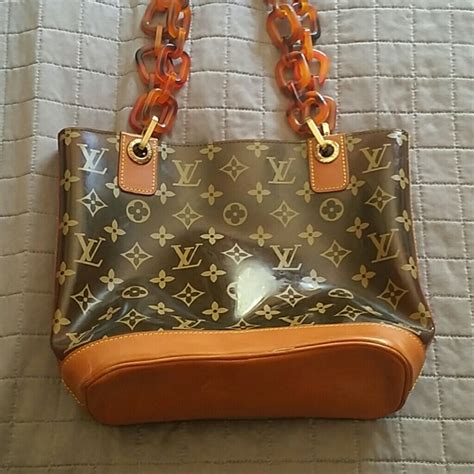 louis vuitton oval purse|louis vuitton clear tote.